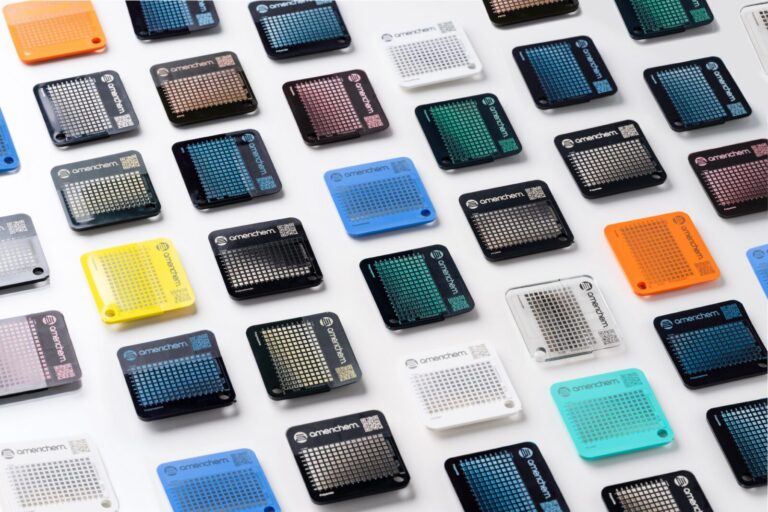Americhem laser marking samples showing high-contrast markings on colored polymer substrates
