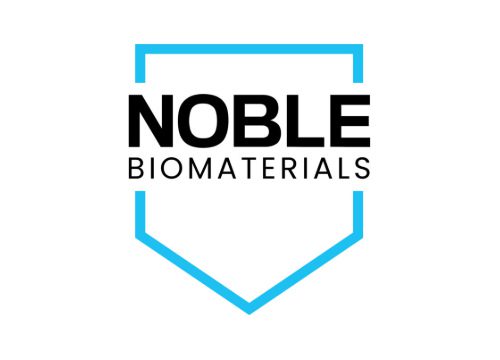 Noble Biomaterials logo featuring the brand name in black text inside a blue shield outline.